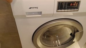 Стирально-сушильная машина Smeg LSF147E