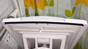 Midea. Стучит крышка вертикальной стиральной машины. Быс