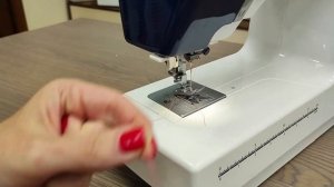 Janome SP903.  Встроенный нитеобрезатель