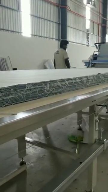 Процесс настилания плотных тканей на автоматической ?