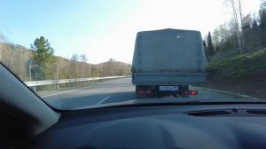 Сломалась машина в первый день после переезда на Алтай. Отбуксировали в город. Добираюсь автостопом.