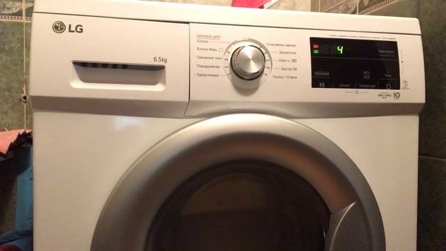 LG F2J3WS1W, 6,5 кг, белая / серебристая.