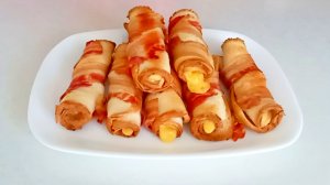 Закусочные рулетики 🫔 из тостового хлеба 🍞, сыра 🧀 и бекона 🥓.