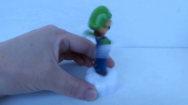 Игрушки Хэппи Мил® в ресторанах Макдональдс: коллекция «Супер Марио», июнь 2016 года, Луиджи