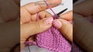 три вместе лицевой петлёй (центральная сверху)