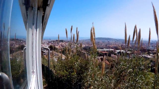 Вид на Барселону из поезда на Тибидабо.