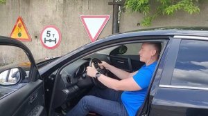 Правильная посадка за рулем автомобиля.