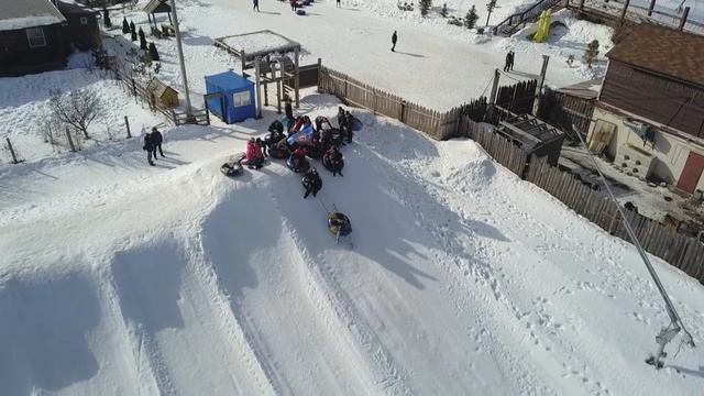 Массовый спуск на ватрушках