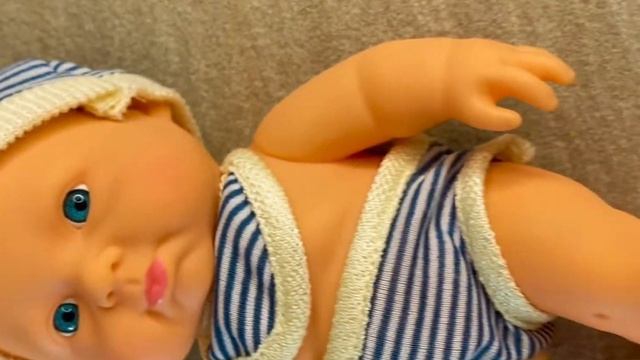 Пупс в полосатом купальнике