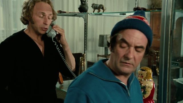 Высокий блондин в черном ботинке 1972