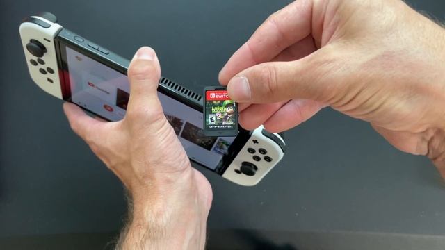 Как вставить картридж в Nintendo Switch смотреть онлайн