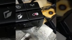 Гравировка символов на автомобильных кнопках