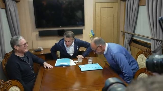 Macron, Merz and Starmer meet aboard a train to Kyiv смотреть онлайн