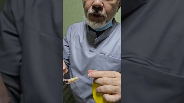 Как одеть зубной протез