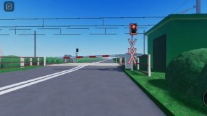 Поезд проезжает австрийский железнодорожный переезд