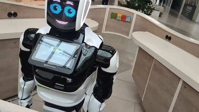 Information Desk In A Shopping Mall.Справочная стойка в. торговом цент