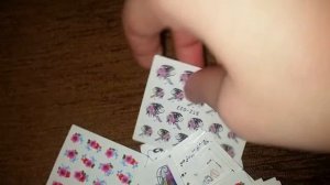 Посылка с AliExpress 50 комплектов наклеик для ногтей супер класс понравилось