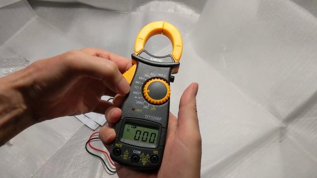 Распаковка клещей мультиметра DT3266F из Rozetka