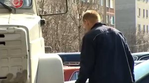 Водитель мусоровоза