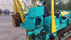 Крутейший экскаватор-погрузчик на гусенницах - первый