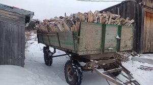 Сколько войдёт кубов колотых дров в тракторную телегу