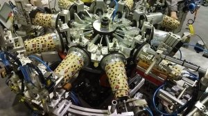 ESTLAB.ru - Роторная машина для сворачивания конусов из фольги