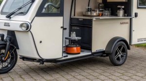 “Электрический трицикл-кемпер: Новая эра свободы пут?