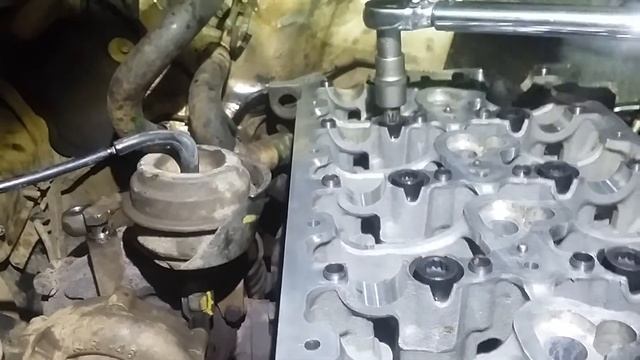 Протяжка головки автомобиля Саньёнг Кайрон ,двигател?