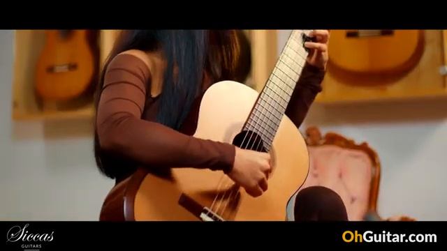 Thu Le plays Danse Macabre by Camille Saint-Saëns 🤩 on a 2022 Zbigniew Gnatek Guitar смотреть онлайн