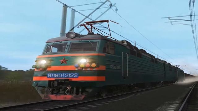 Широкий ВЛ80с-2122/2151 с грузовым поездом быстро едет смотреть онлайн