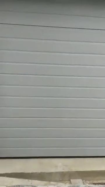 Серые гаражные ворота Doorhan Донецк