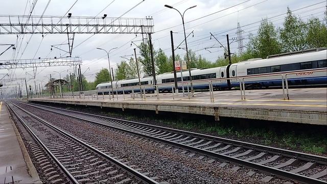 23 мая 2025 г. Высокоскоростной Электропоезд Сапсан ЭВС1-14 Следует с резервом Славянка смотреть онлайн