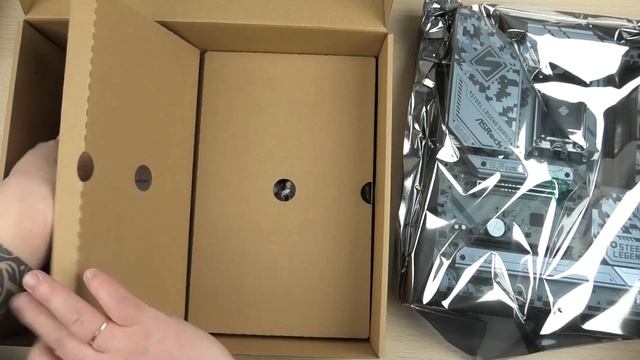Розпаковка ASRock B650 STEEL LEGEND WIFI смотреть онлайн