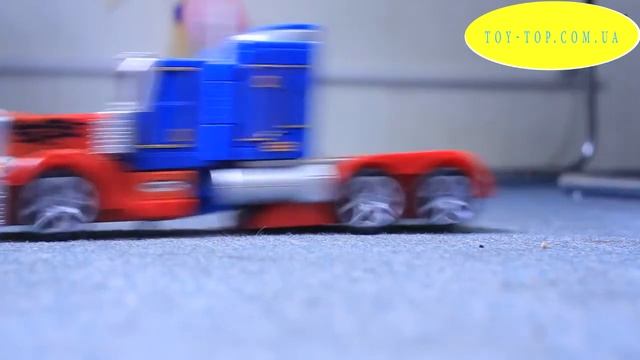 Трансформер Оптимус Прайм робот игрушка на радиоупра? смотреть онлайн