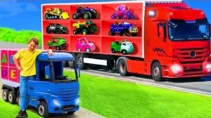 Дети играют с большим настоящим грузовиком