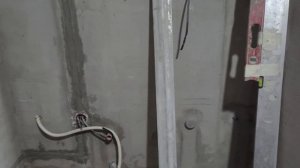 Штукатурка стен в ванной под плитку. Как выровнять кри