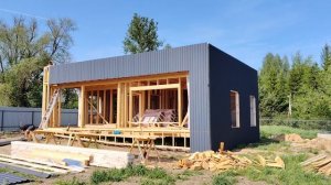 Отделка фасада каркасного дома профлистом. Дом в стиле хайтек