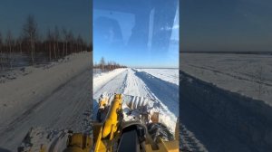 Чистка дорог Амкодор боковой отвал