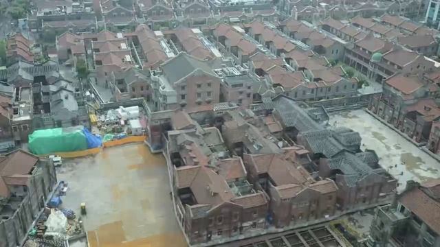 В Шанхае 432 робота перенесли комплекс исторических зданий весом 7 500 тонн, а затем вернули обратно смотреть онлайн