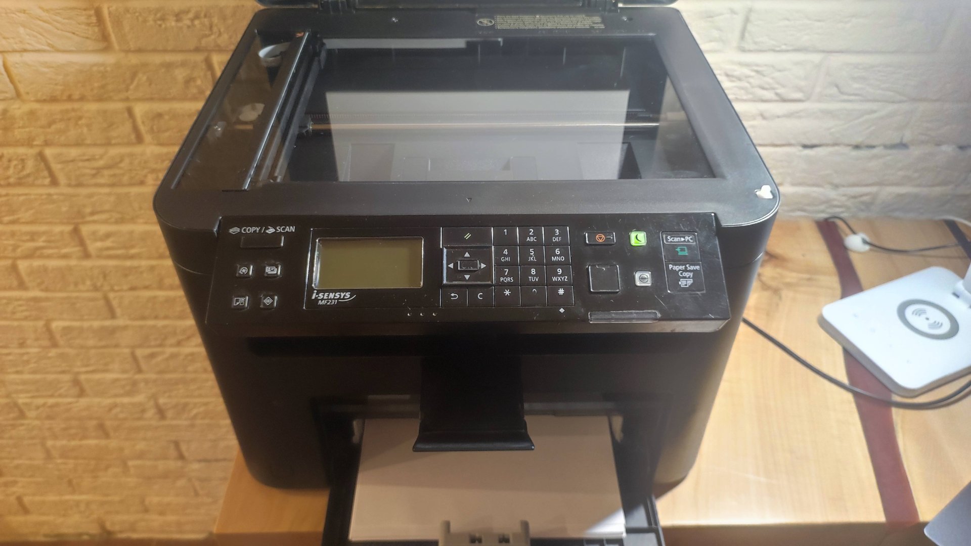 Принтер МФУ Canon MF-231 i-sensys в работе смотреть онлайн