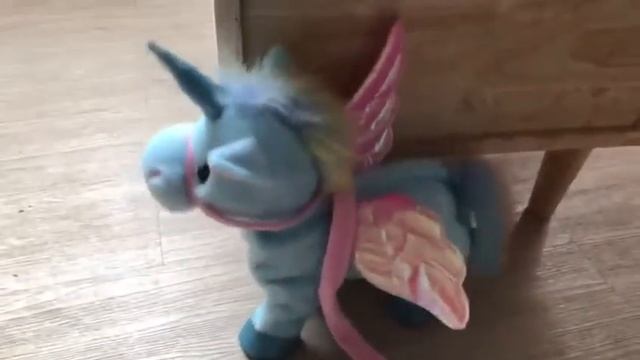 Музыкальная игрушка Единорог на управлении