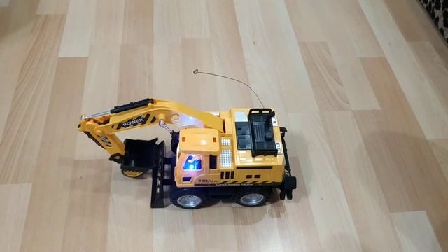 Экскаватор, бульдозер на радиоуправлении с подсветко?