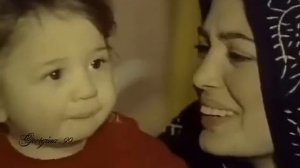 Тополёк мой в красной косынке