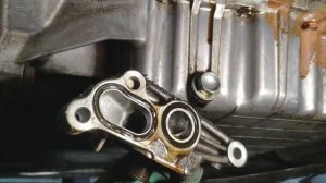 Замена прокладки кронштейна масляного фильтра Honda