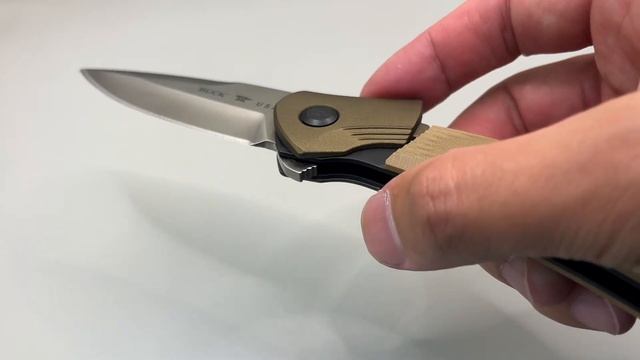 Нож с нефиксированным лезвием Buck PARADIGM BROWN G-10 590BRS