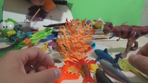 мультик Морские животные игрушки и крокодил динозавры  распаковка обзор Видео для детей