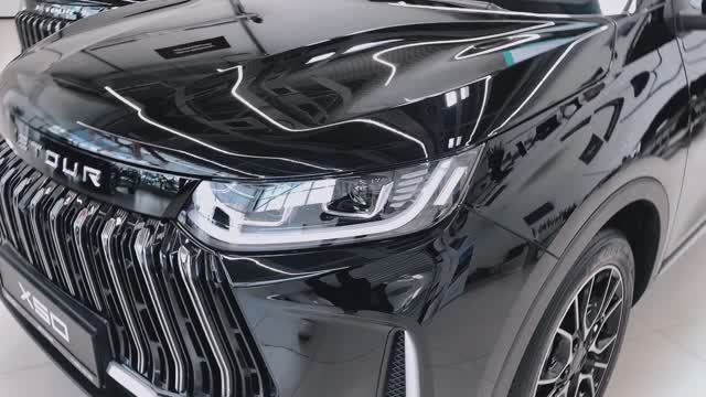 JETOUR X50 Luxury чёрный на чёрно-красном салоне