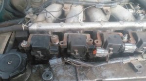 Катушка зажигания . свечные колпачки