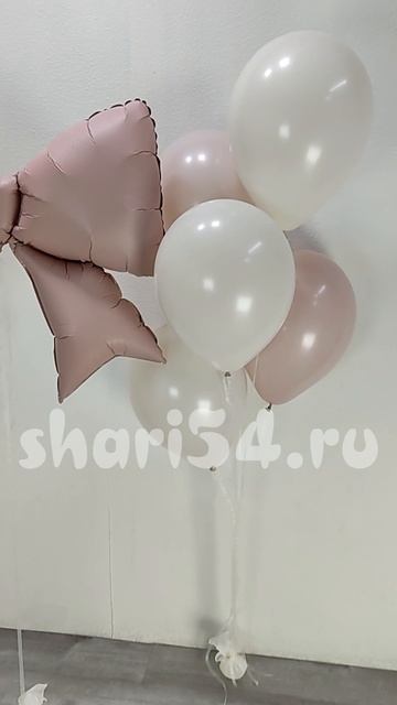 Шарики на выписку девочке с бантом