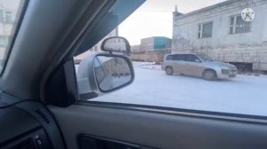 Постановка транспортного средства на место стоянки при движение задним ходом с поворотом на 90 граду